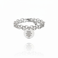 Bracciale sospeso su sfondo bianco specchiato